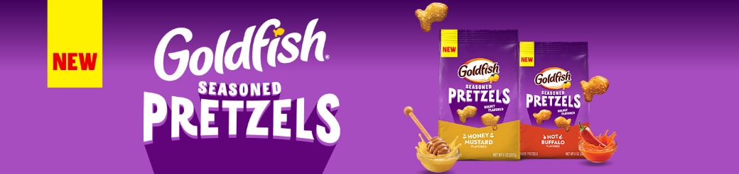 Two bags of Goldfish® Seasoned Pretzels sit on a purple background with flavor cues placed beside each.